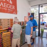 Customers Checking Out Our Traeger Wood Fire Grills Section at BBQ Concepts of Las Vegas, Nevada